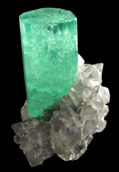 Beryl var. Emerald with Calcite from Coscuez Mine, Muzo, Vasquez-Yacopí Mining District, Boyacá Department, Colombia [db_pics/pics/emerald1a.jpg]