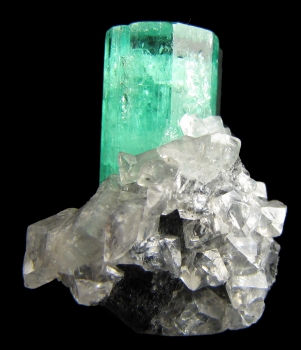 Beryl var. Emerald with Calcite from Coscuez Mine, Muzo, Vasquez-Yacopí Mining District, Boyacá Department, Colombia [db_pics/pics/emerald1b.jpg]