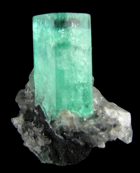 Beryl var. Emerald with Calcite from Coscuez Mine, Muzo, Vasquez-Yacopí Mining District, Boyacá Department, Colombia [db_pics/pics/emerald1c.jpg]