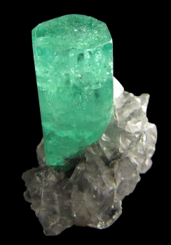 Beryl var. Emerald with Calcite from Coscuez Mine, Muzo, Vasquez-Yacopí Mining District, Boyacá Department, Colombia [db_pics/pics/emerald1d.jpg]