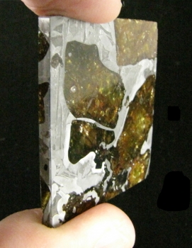Meteorite Slice Var. Stony Iron, pallasite from Fukang, Xinjiang Province, China [db_pics/pics/fukang1c.jpg]