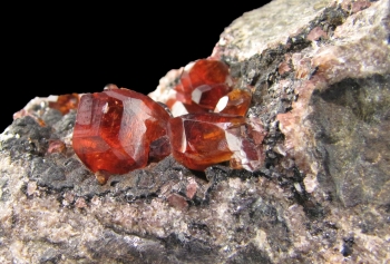 Rhodochrosite on matrix from Uchucchacua Mine, Oyon Prov., Lima Dept., Peru [db_pics/pics/rhodochrosite1d.jpg]
