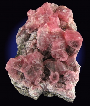 Rhodochrosite on matrix from Uchucchacua Mine, Oyon Prov., Lima Dept., Peru [db_pics/pics/rhodochrosite4a.jpg]