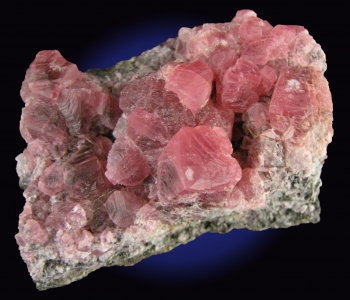 Rhodochrosite on matrix from Uchucchacua Mine, Oyon Prov., Lima Dept., Peru [db_pics/pics/rhodochrosite4c.jpg]