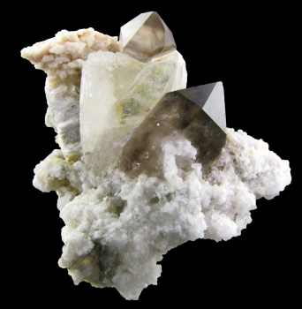 Amblygonite with Smoky Quartz and Feldspar from Telirio Mine, Divina das Laranjeiras, Minas Gerais, Brazil [db_pics/pics/amblygonite1b.jpg]