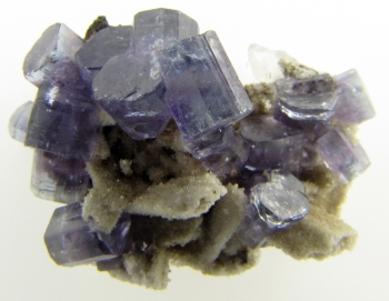 Apatite and Bertrandite on Quartz from Golconda District, Governador Valadares, Minas Gerais, Brazil [db_pics/pics/apatite1a.jpg]