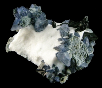 Benitoite w/ Neptunite on Natrolite from Benitoite Gem Mine, San Benito County, California [db_pics/pics/benitoite1c.jpg]