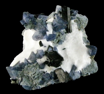 Benitoite w/ Neptunite on Natrolite from Benitoite Gem Mine, San Benito County, California [db_pics/pics/benitoite1d.jpg]