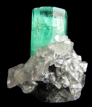 Beryl var. Emerald with Calcite from Coscuez Mine, Muzo, Vasquez-YacopÃ­ Mining District, BoyacÃ¡ Department, Colombia [db_pics/pics/emerald1b.jpg]
