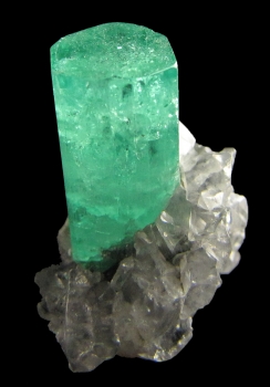 Beryl var. Emerald with Calcite from Coscuez Mine, Muzo, Vasquez-YacopÃ­ Mining District, BoyacÃ¡ Department, Colombia [db_pics/pics/emerald1d.jpg]