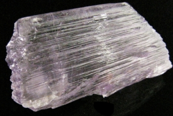 Spodumene Var. Kunzite from Oceanview Mine, Elizabeth R. Mine (Hazel W. claim), Chief Mountain,  Pala District, San Diego Co., California [db_pics/pics/kunzite1e.jpg]