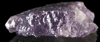 Spodumene Var. Kunzite from Oceanview Mine, Elizabeth R. Mine (Hazel W. claim), Chief Mountain,  Pala District, San Diego Co., California [db_pics/pics/kunzite1f.jpg]