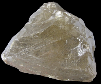 Quartz Var. Rutilated (rough and sphere) from Minas Gerais, Brazil [db_pics/pics/quartz34c.jpg]