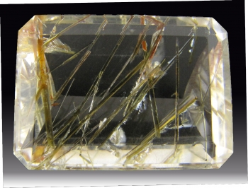 Rutilated Quartz (rough and cut) from Minas Gerais, Brazil [db_pics/pics/quartz52d.jpg]